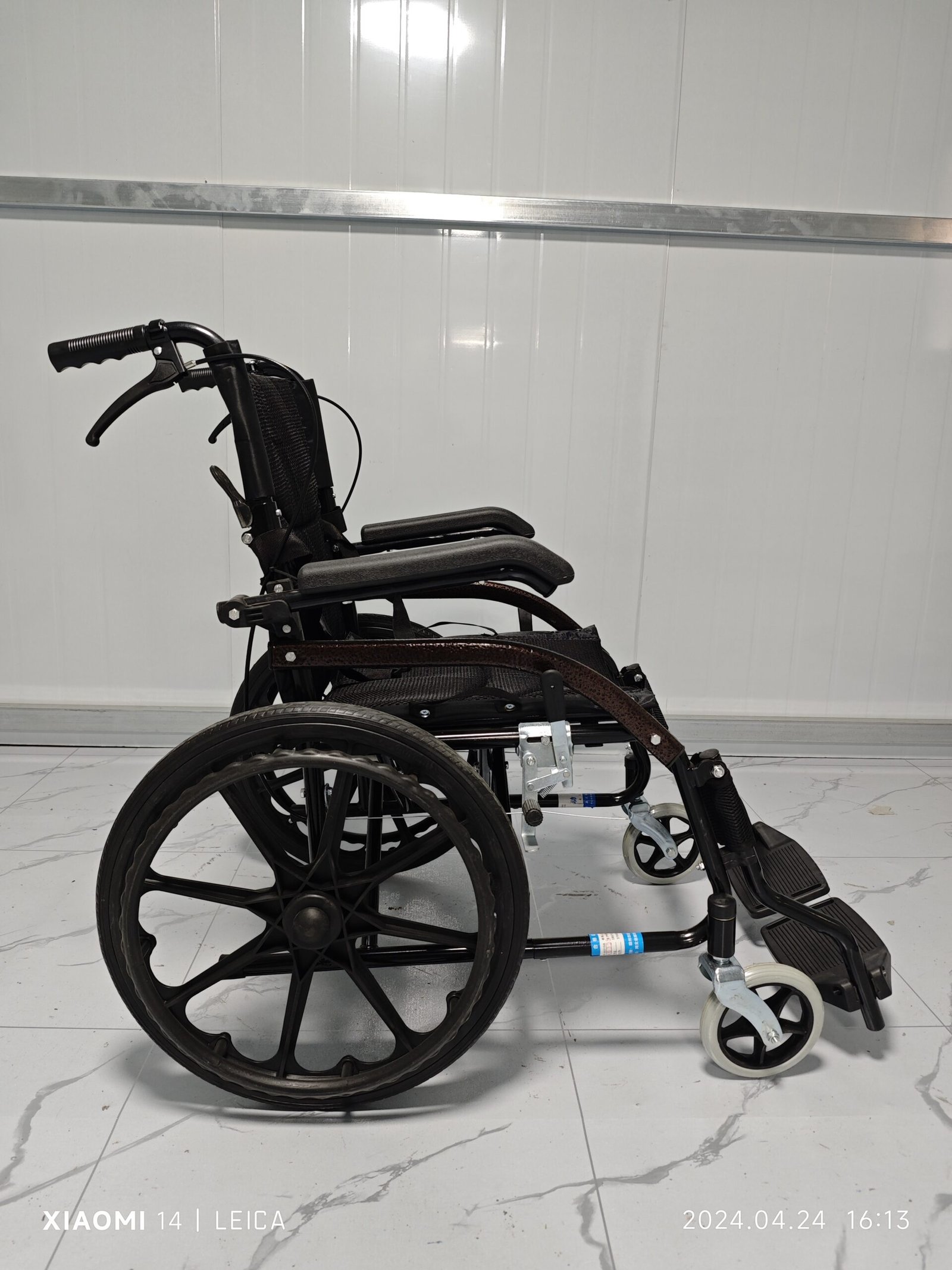 NL190301G-1 Multifunctional Wheelchairs with Adjustable Armrests Side View